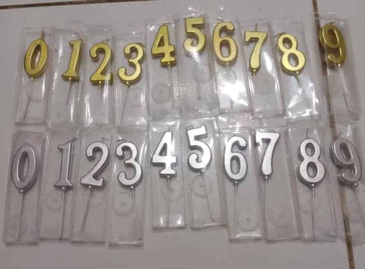 Vela de Número 1 Plateado's foto | Milán Roches |  BizneCubano